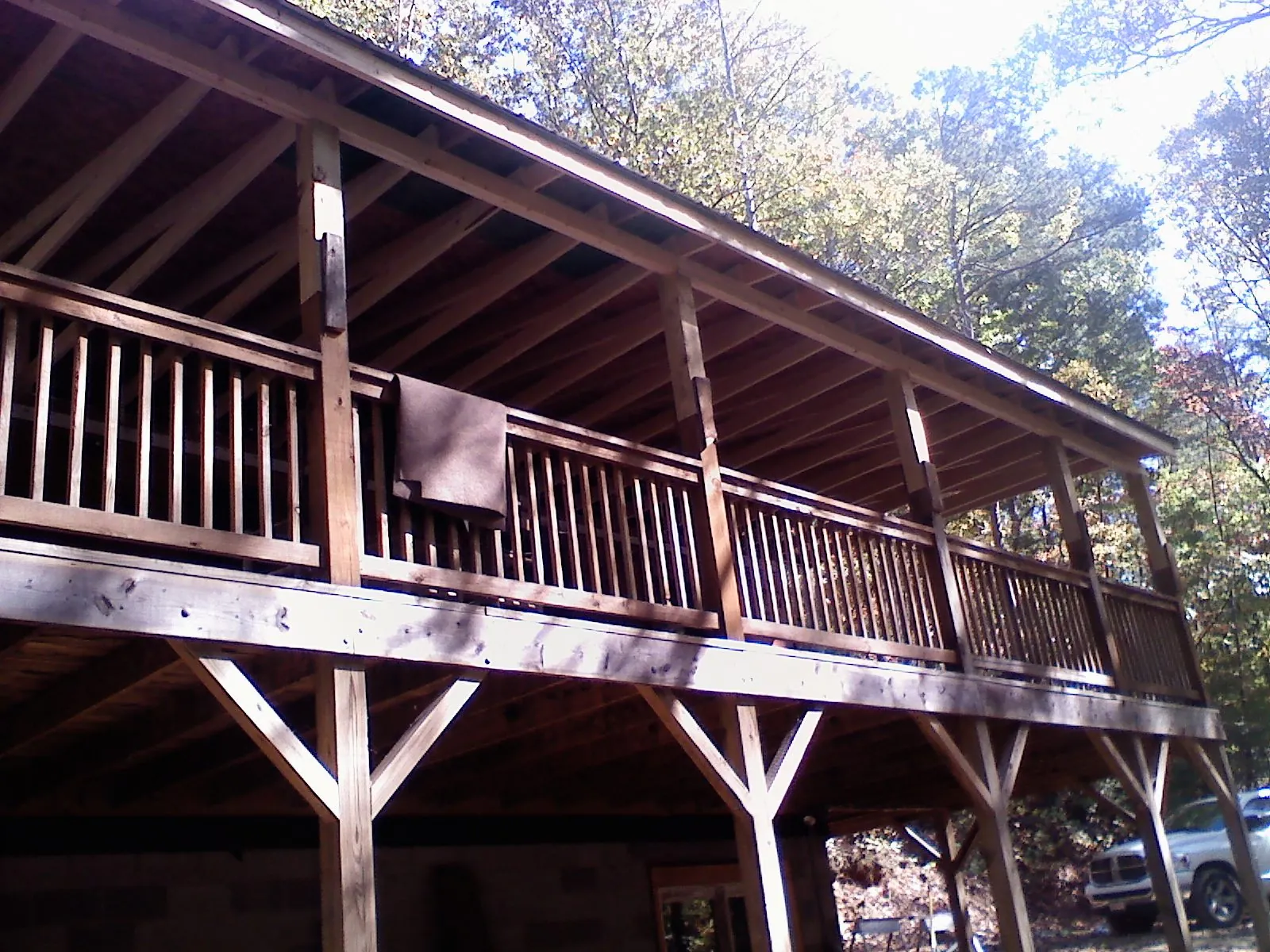 Timber framing under a new elevated porch and deck — Roof Leak Repair in Kings Mountain by Roofing Brothers